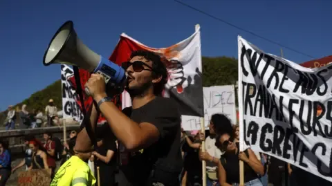 Nationwide Strikes Erupt Opposing Budget Slashing